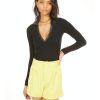 GENERATION LOVE Willa Polo Top In Black Tops